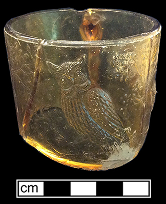 Amber glass “Bird on Branch mug; part of Beaded Handle set produced by the Bryce Brothers in the 1880s, when the company may have been known as Bryce, Walker & Co. The Brewhouse mug is missing its pleated skirt base. 